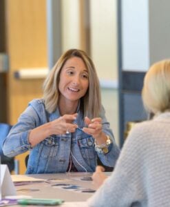 Elisabeth Jones works on a group project with members of her CONVEY cohort during the summer institute.