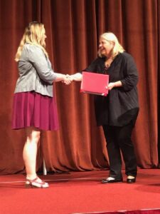 Dr. Karen Jones receives the Wedemeyer Award.