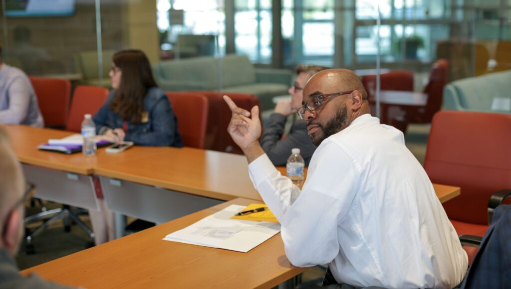 Participants in the summit engage in a group discussion about ways to integrate their findings from the equity summit into their school districts. 