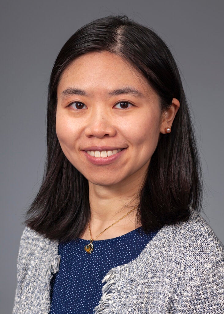headshot of woman wearing business professional