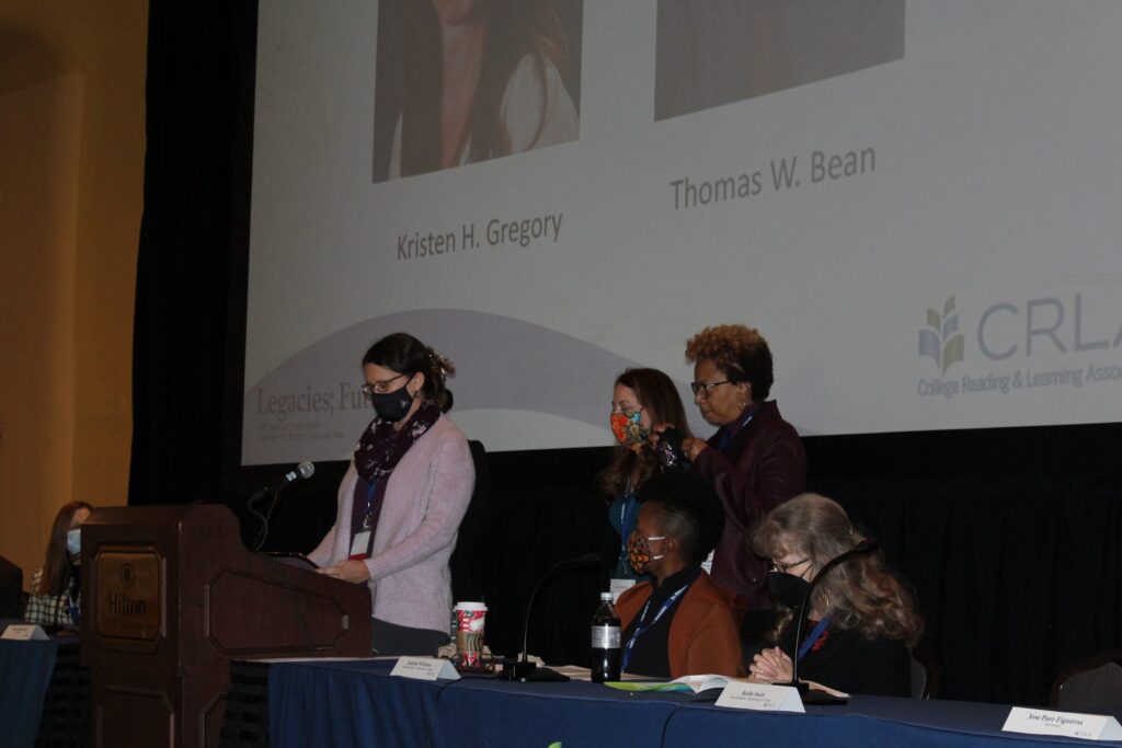 Kristen Gregory receiving her award at the JCRL conferece