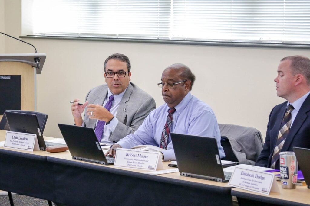 Chris Locklear, left, ECU Vice Provost for Academic Success, was voted Chairman of the ECU Lab School Advisory Board. 