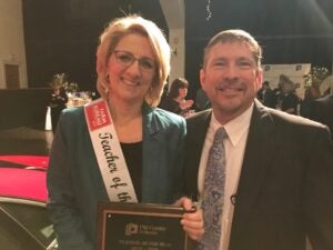 Julie Brickhouse, left, a special education teacher at Wahl Coates Elementary School of the Arts, was named the Pitt County Schools Teacher of the Year on March 14 at Rock Springs Center. 