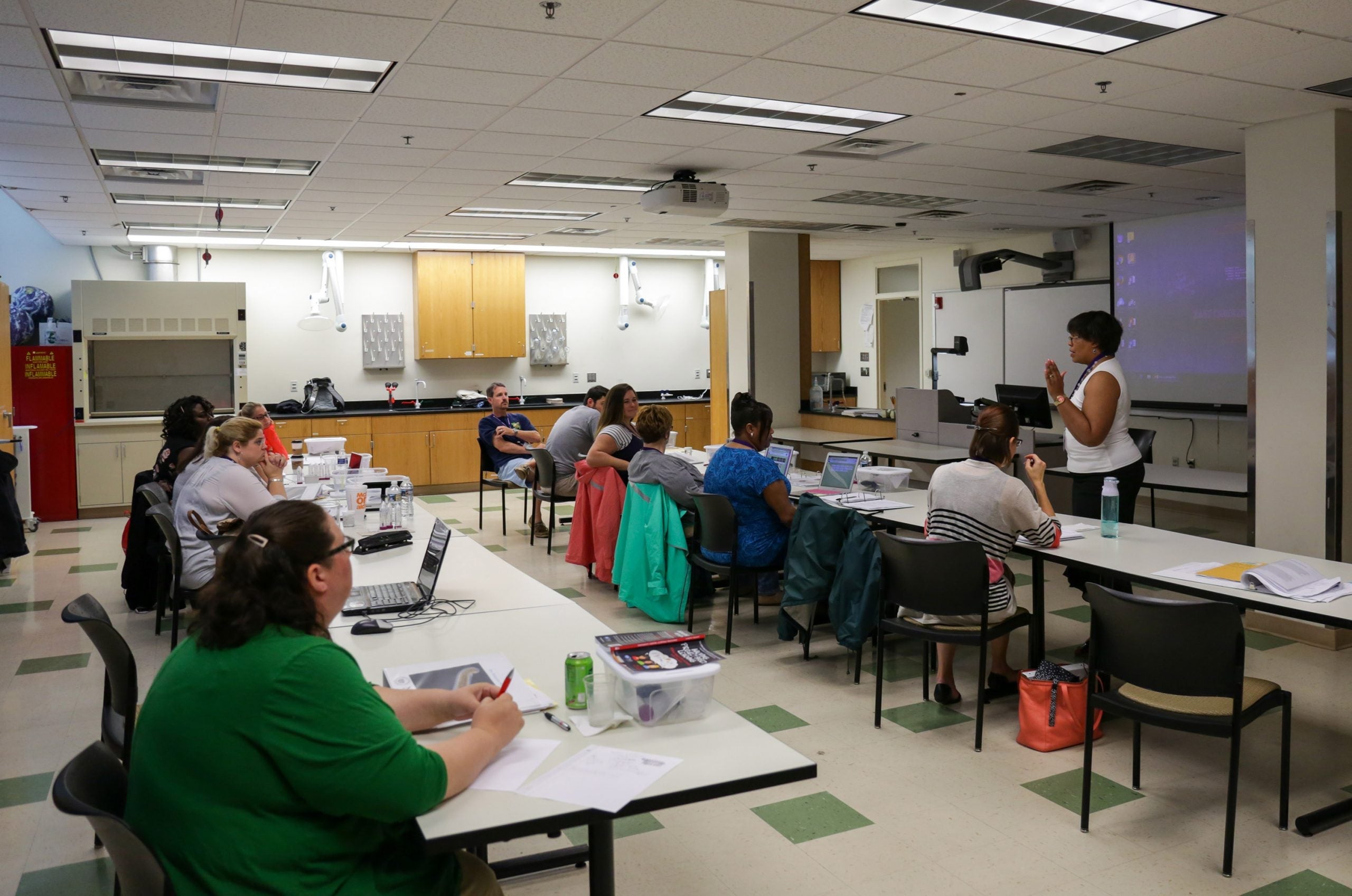 Teachers from five local counties learn a drug dependency exercise to take back to their classrooms during a Science Education Against Drug Abuse Partnership workshop at ECU June 21. 