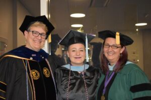 Graduate Elizabeth Japczyk Shuler with professors Dr. Tschida and Dr. Cuthrell