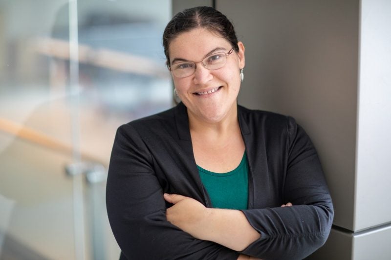 female faculty poses for photo