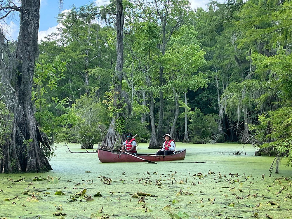Two students in a canoe 